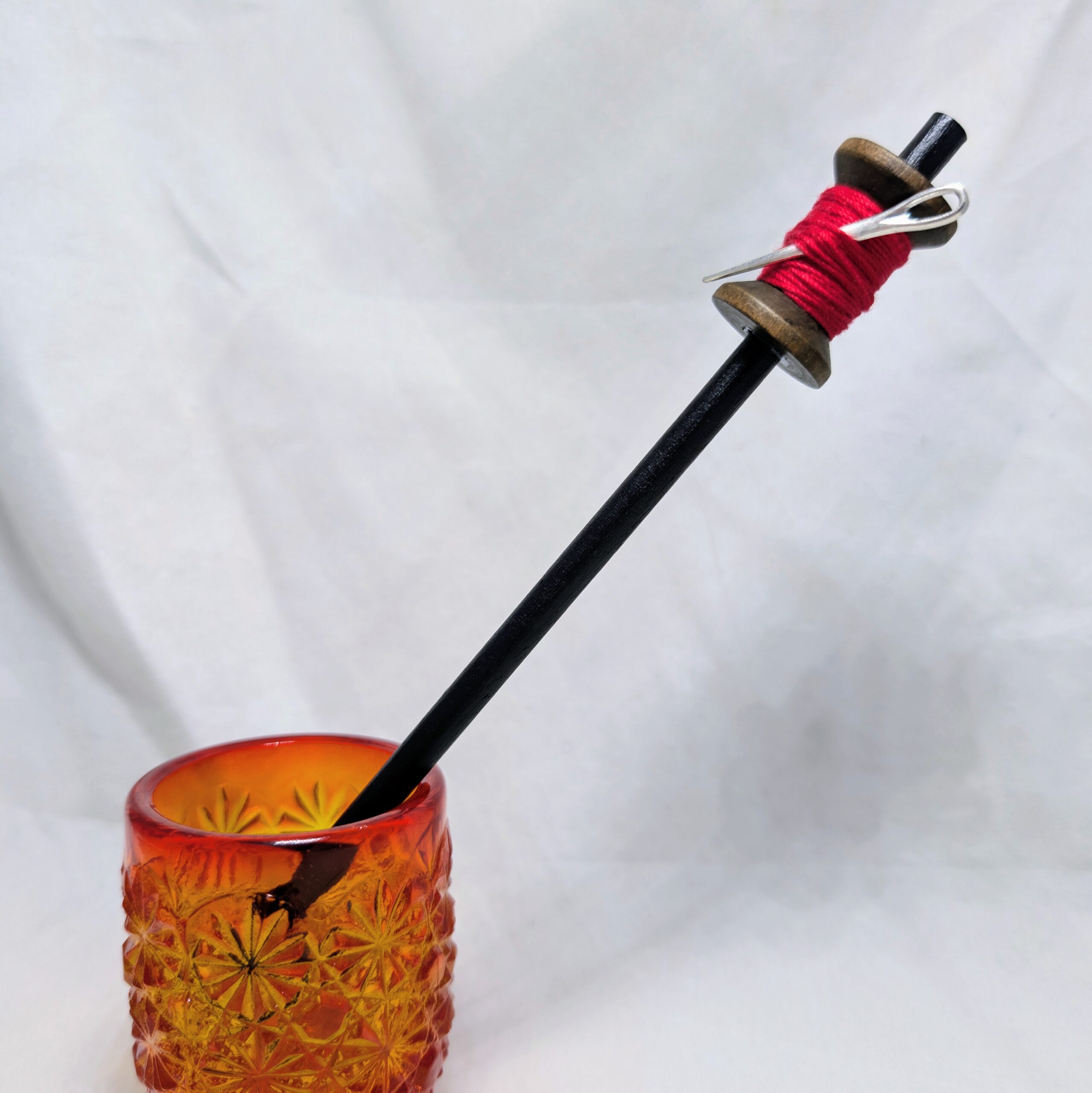 Alternative view of threaded spools hair sticks